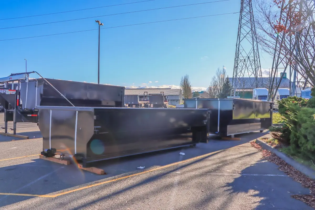 Roll-off dumpster ready for waste disposal at job site for Roofing Dumpster Rental in West Caldwell